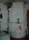 Рис.13 - Дом в Каргополе (середина XIX в.) Печь в одной из комнат второго этажа. Фото автора. 2007 г.
